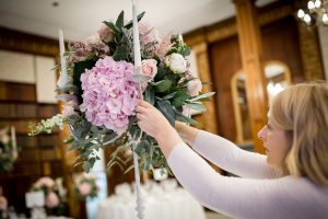 wedding florist working at Clevedon Hall
