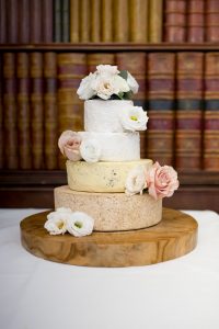 wedding cheese cake decorated with fresh flowers
