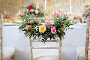 Floral garland wedding chair decor