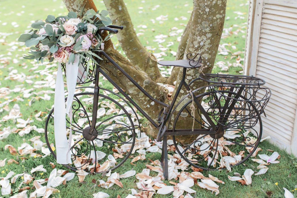 Vintage bike styled with wedding flowers at Barley Wood