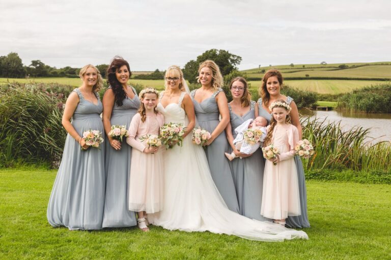 bride and bridesmaids with flower girls