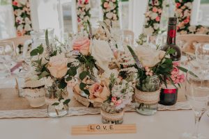 vintage inspired jam jar wedding flowers at barley wood