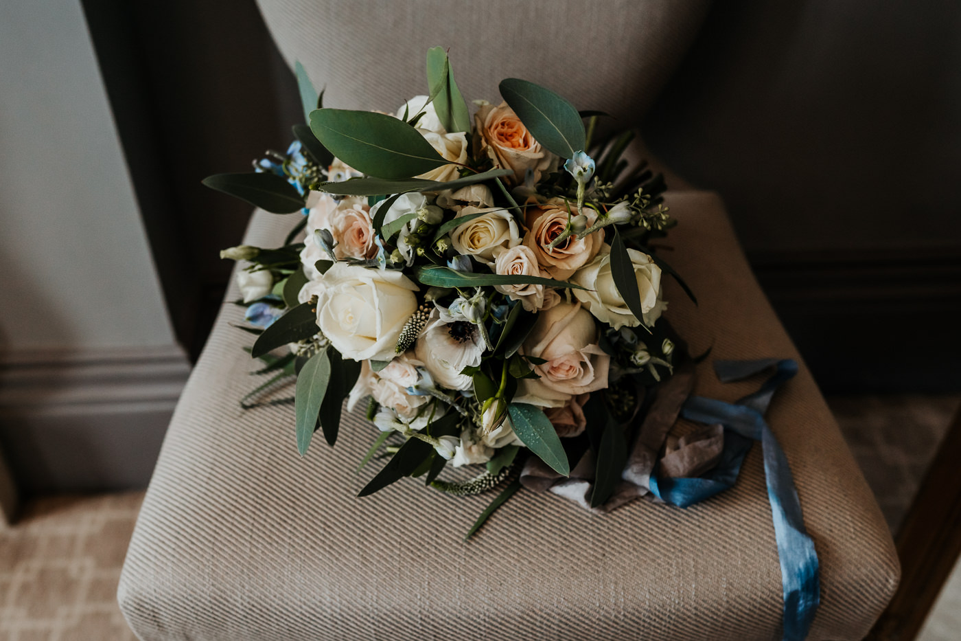 Daisy Lane Floral Design Bridal Bouquet with light blue trailing silk ribbons