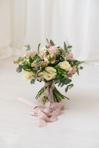 pale pink and ivory bridal bouquet with pink silk trailing ribbon